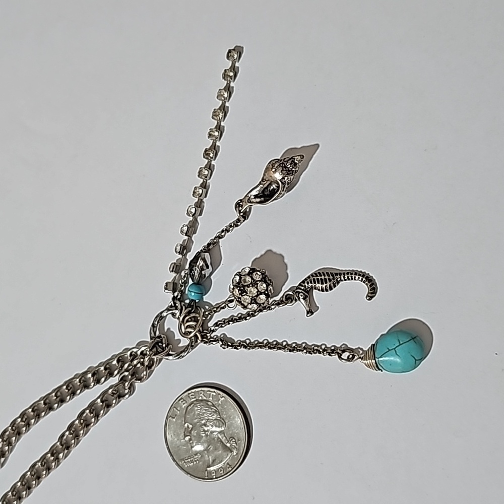 Silver tone multi dangle pendant necklace sea